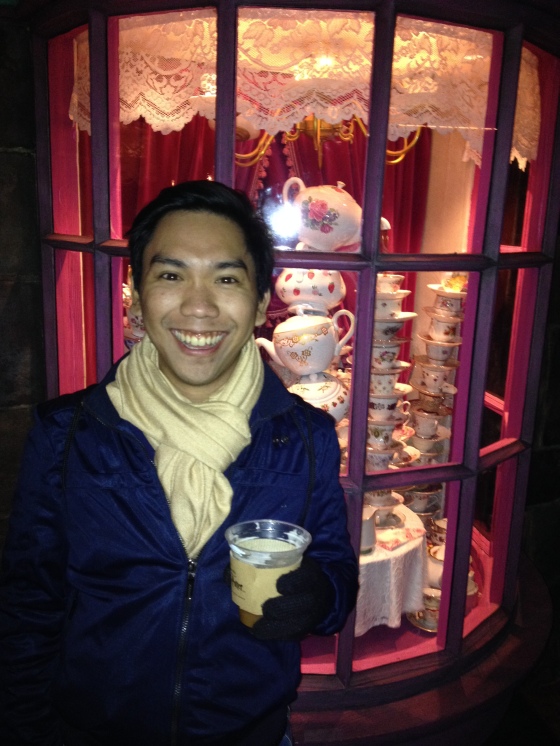 Enjoying warm Butterbeer at the Wizarding World of Harry Potter at Universal Studios, Osaka